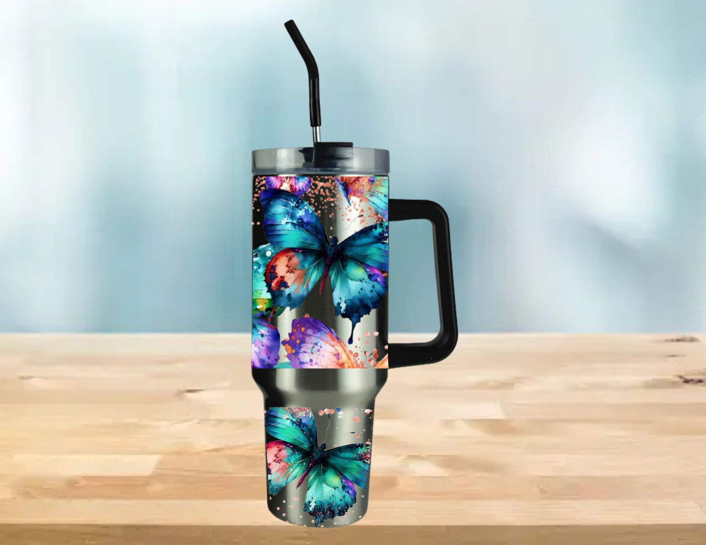 40 OZ TUMBLER WITH HANDLE BUTTERFLIES ON SILVER